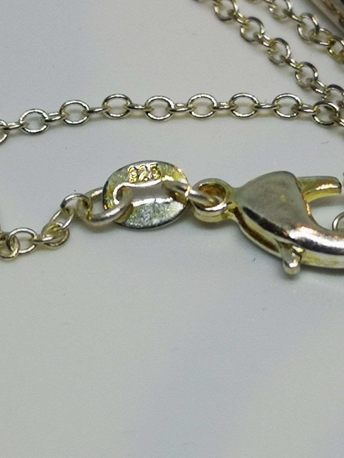Earthstore® Large Rutilated Angel Hair necklace (Solid silver setting and silver chain)
