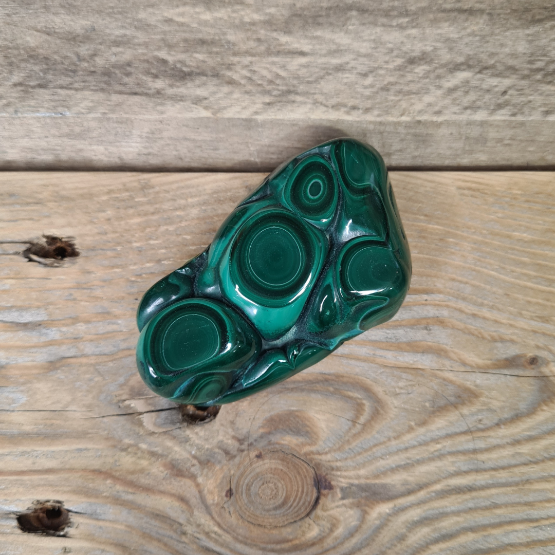 Earthstore® Malachite display: heart chakra; protection; calming; peace; manifesting