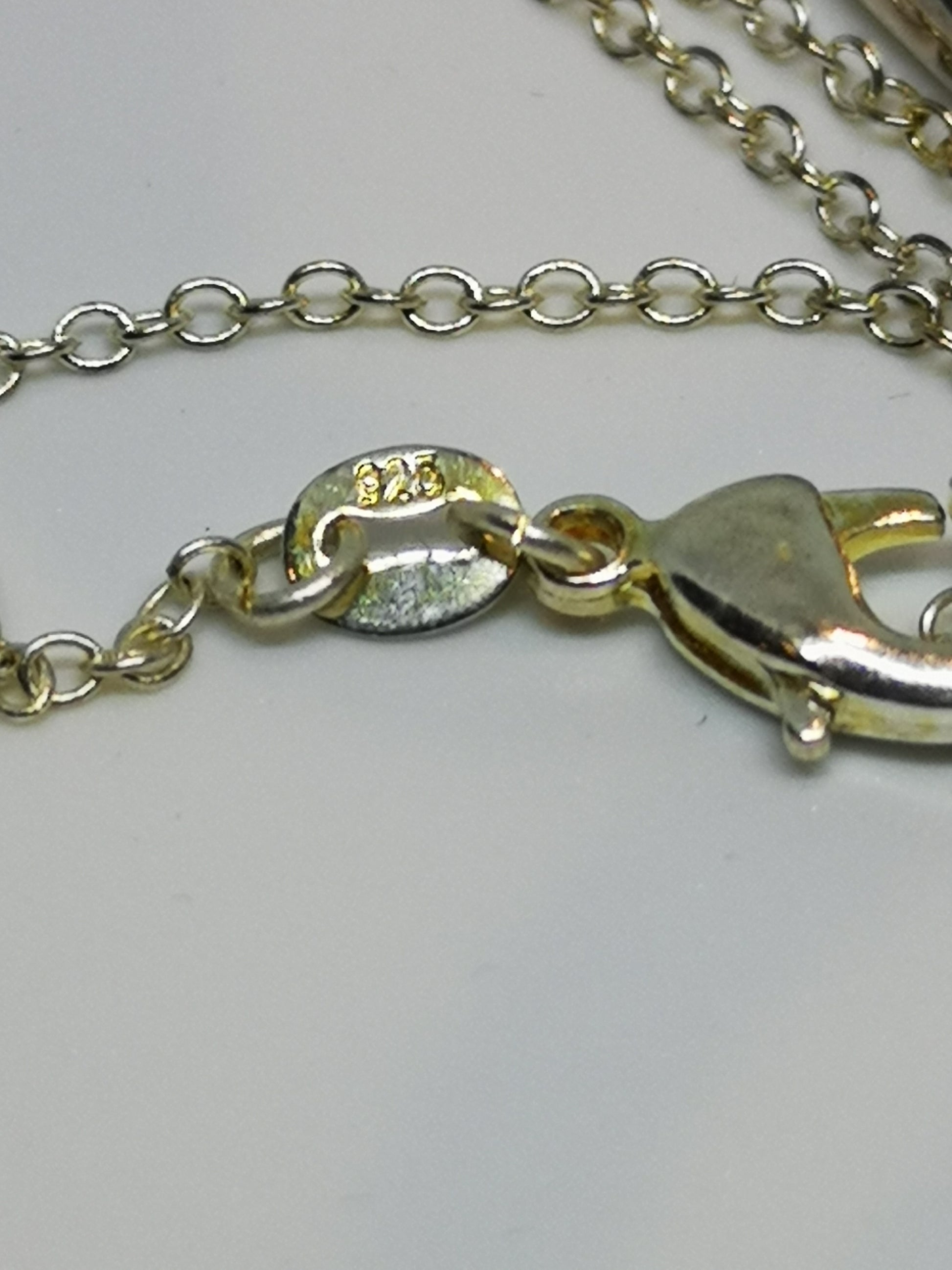 Earthstore® Large Rutilated Angel Hair necklace (Solid silver setting and silver chain)
