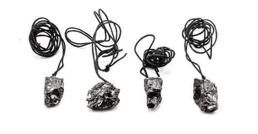 Four elite shungite necklaces with rock-like pendants from earthstore