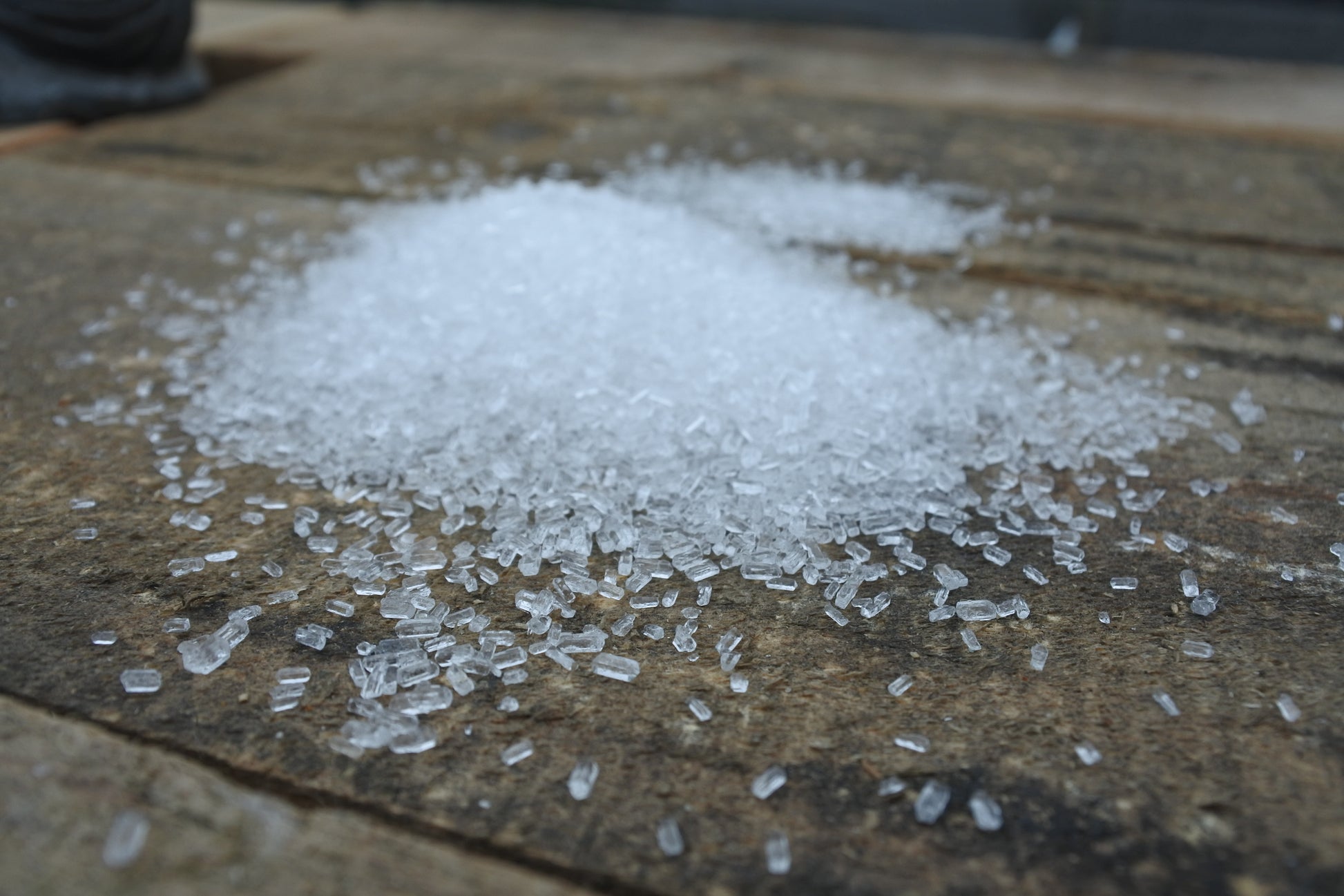 epsom salts on 
wooden surface