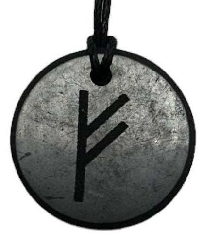 A circular black pendant necklace featuring a black runic symbol on a textured gray background, suspended from a black cord against a solid white background.