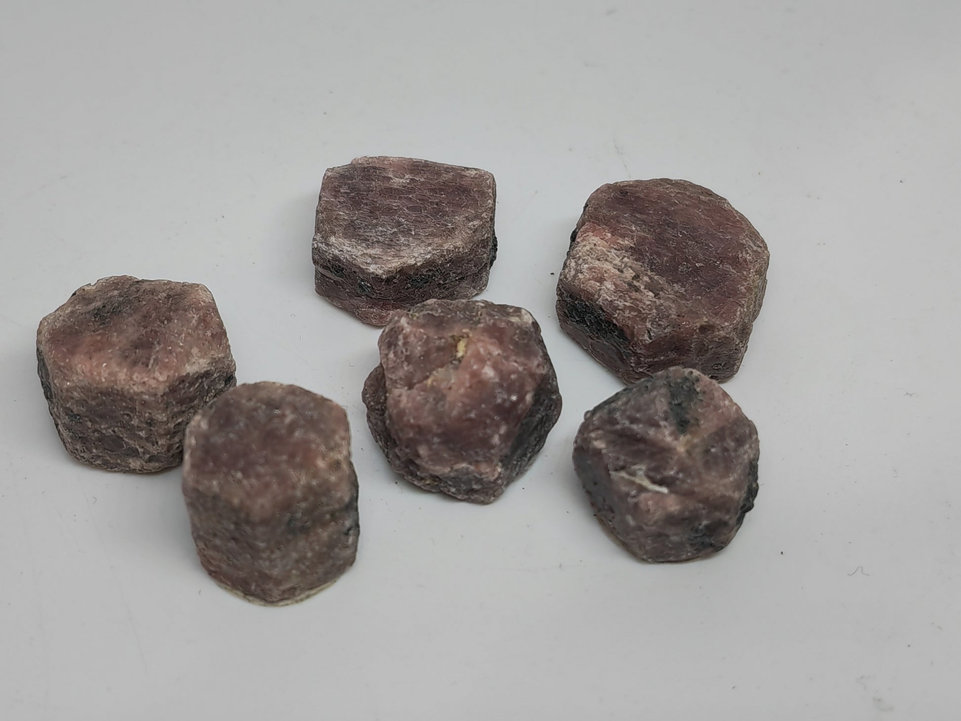 Hexagonal brown stones on a gray background